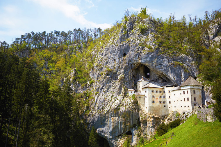 predjama castle built into a mountain in postojna slovenia 