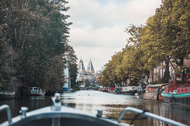Amsterdam Canal Boat Ride Views of City Bridges Bikes