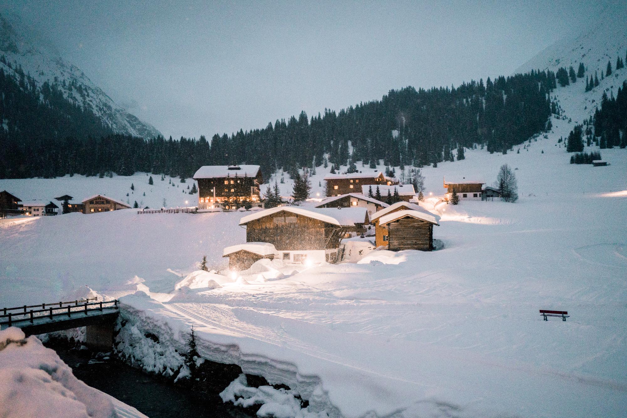 Snow-covered rooftops of hotels and restaurants downtown Lech Austria Ski Town