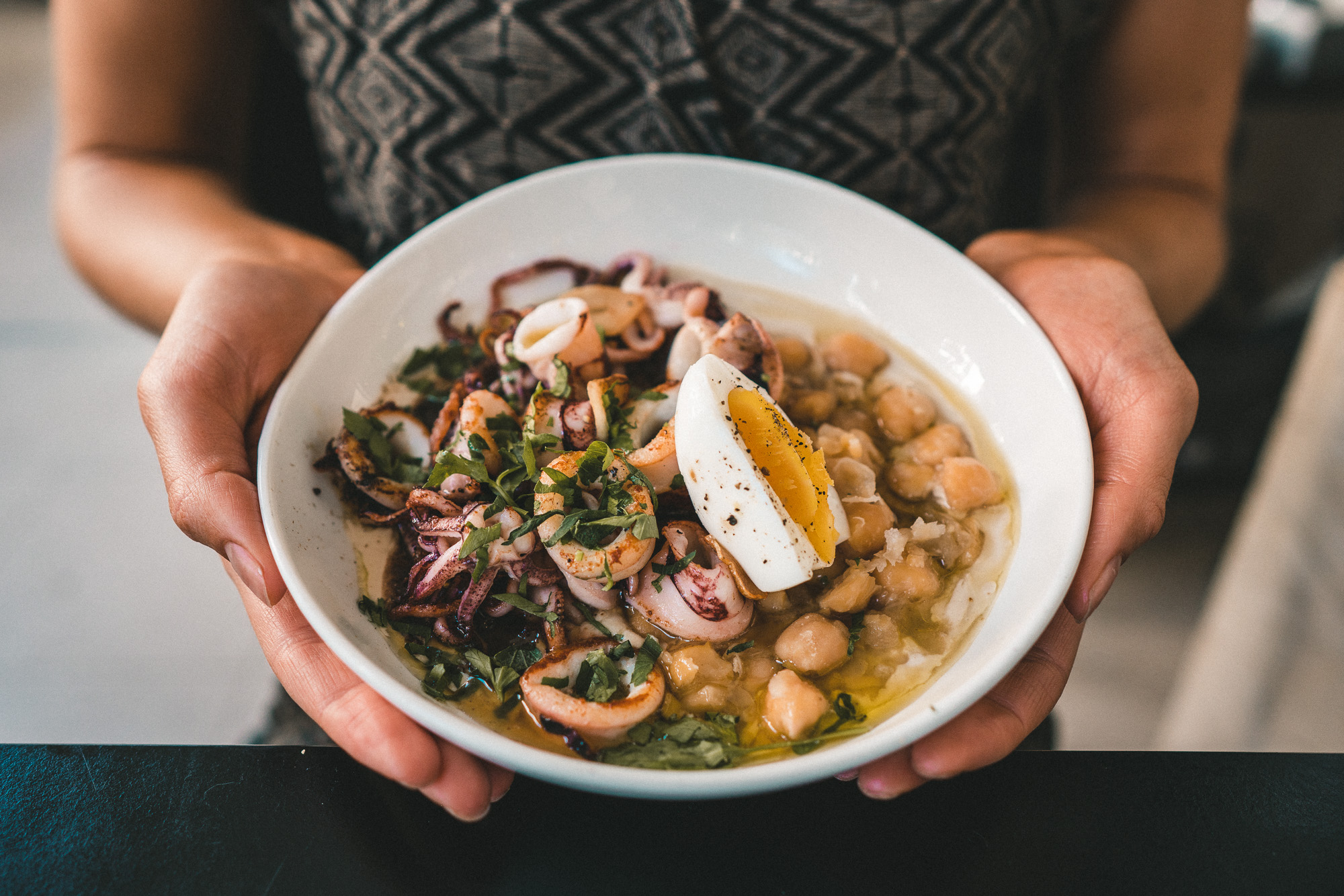 Fresh hummus and calamari bowl in Tel Aviv Israel