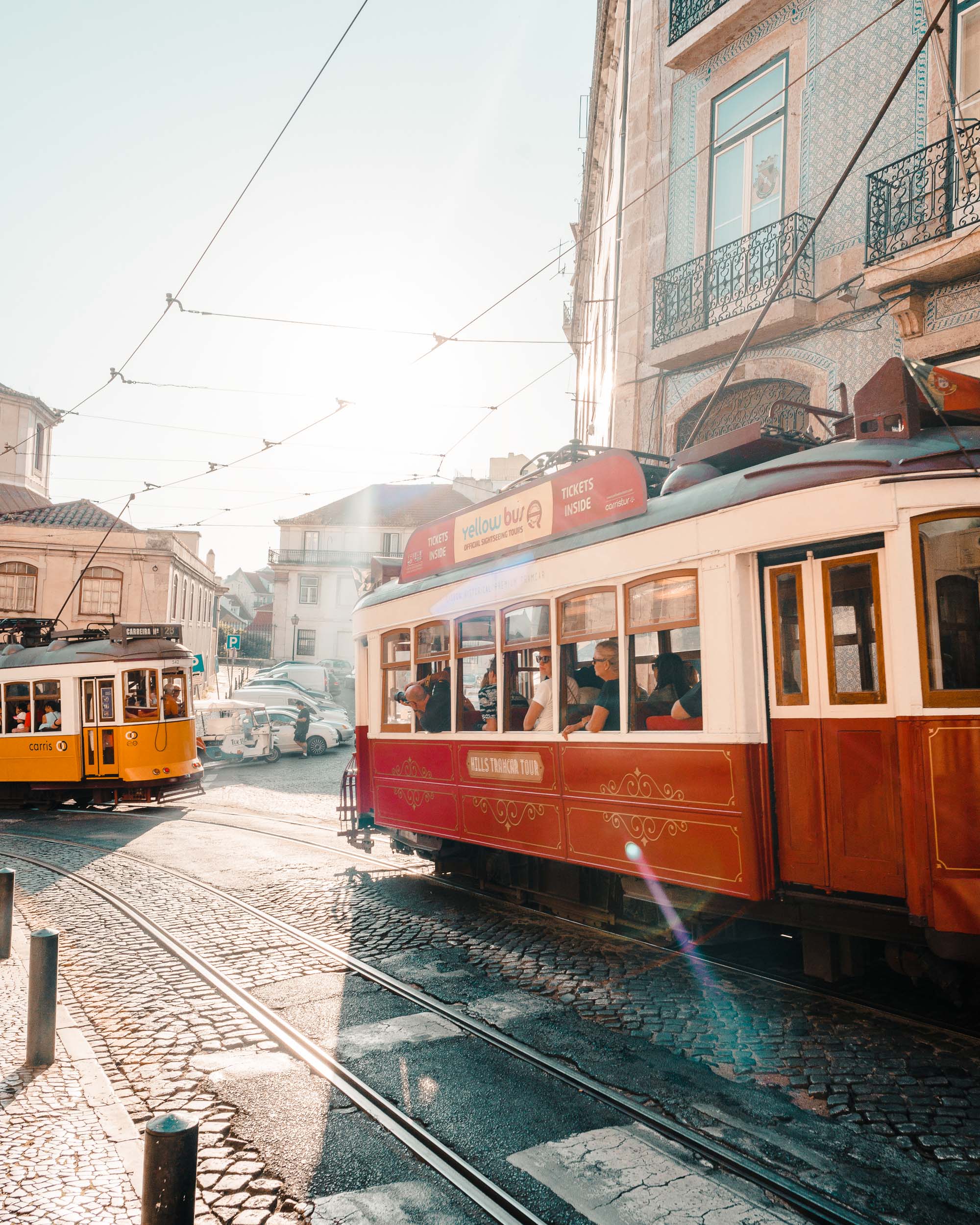 Old school trams in Alfama, Lisbon, Portugal | Lisbon Travel Guide via Find Us Lost