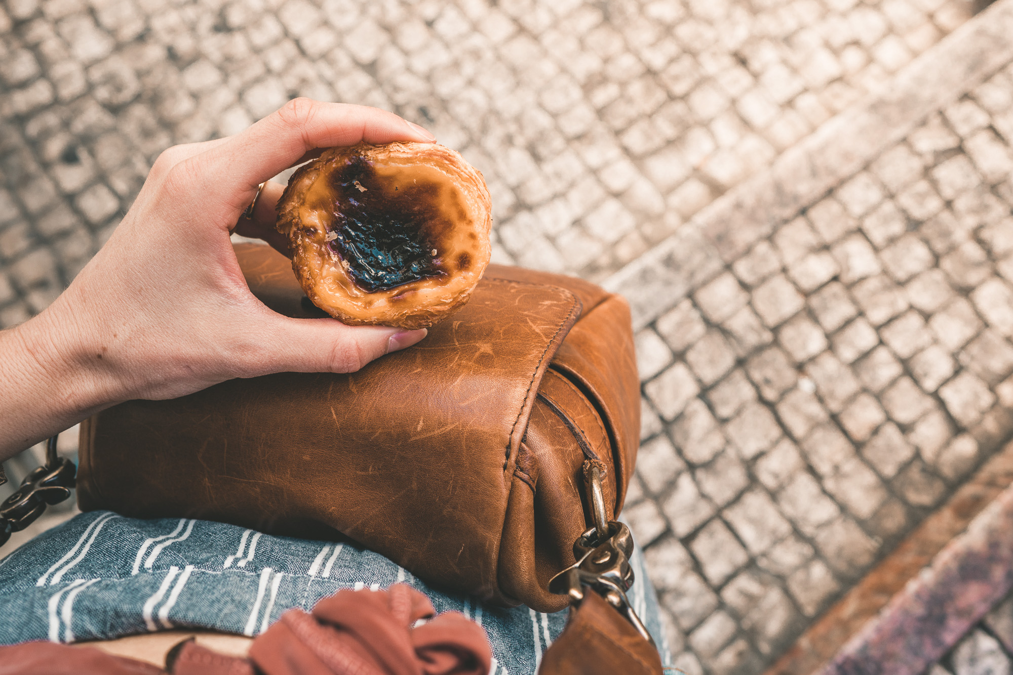 Grabbing freshly Pastel de Nata pastries in Lisbon, Portugal | Lisbon Travel Guide via Find Us Lost