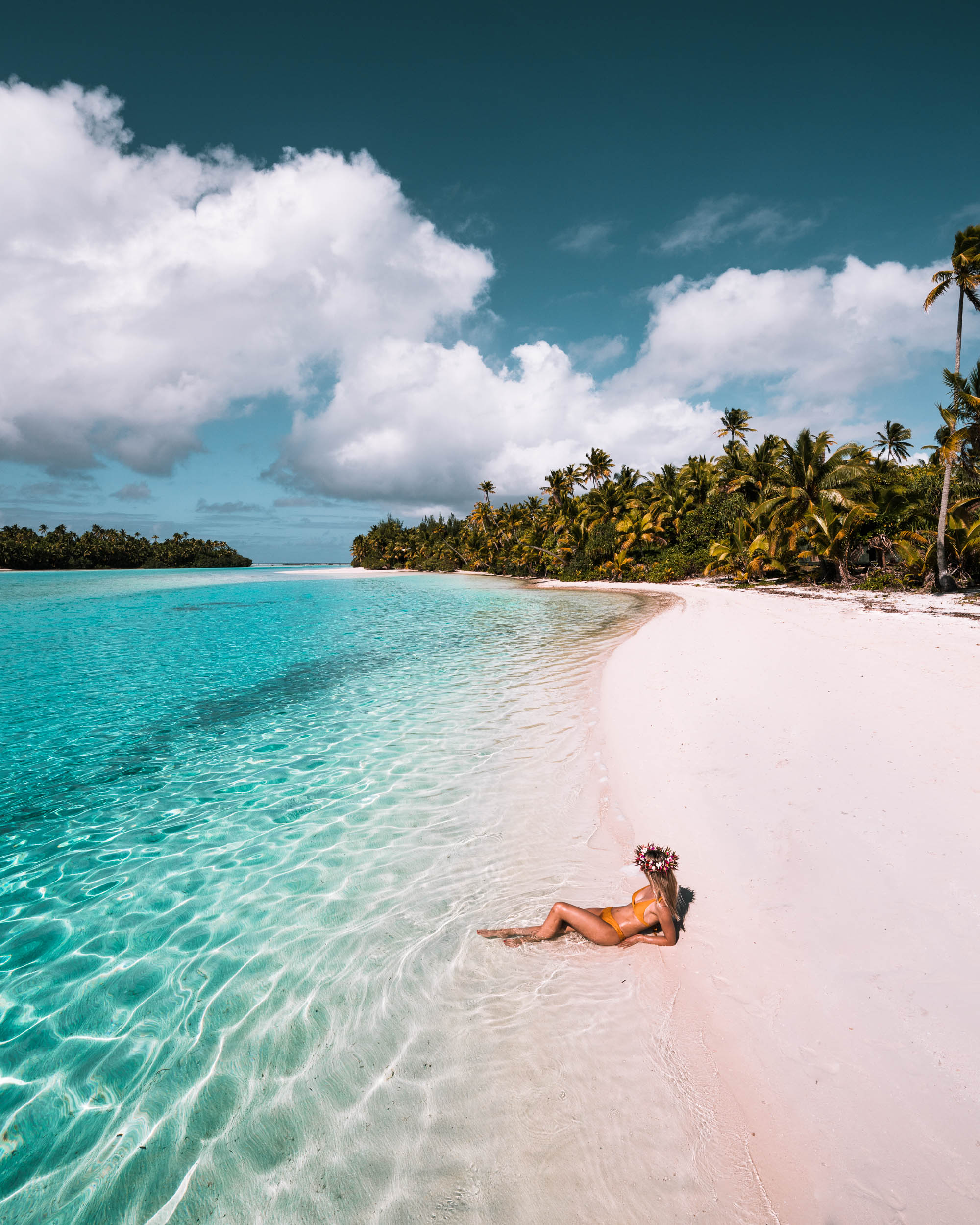 White sand beaches and palms on One Foot Island in Aitutaki, Cook Islands