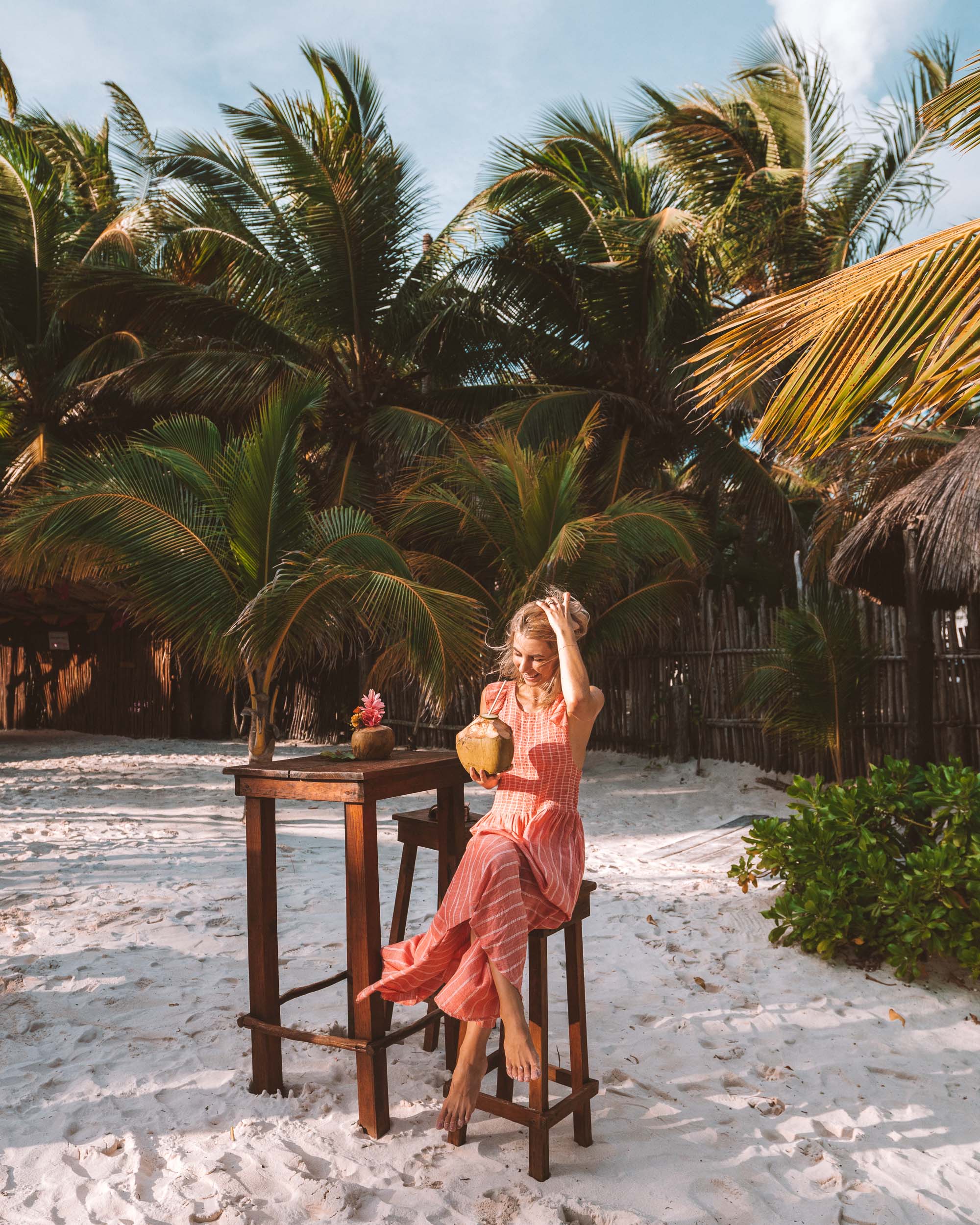 Pink dress in Tulum Mexico via Find Us Lost