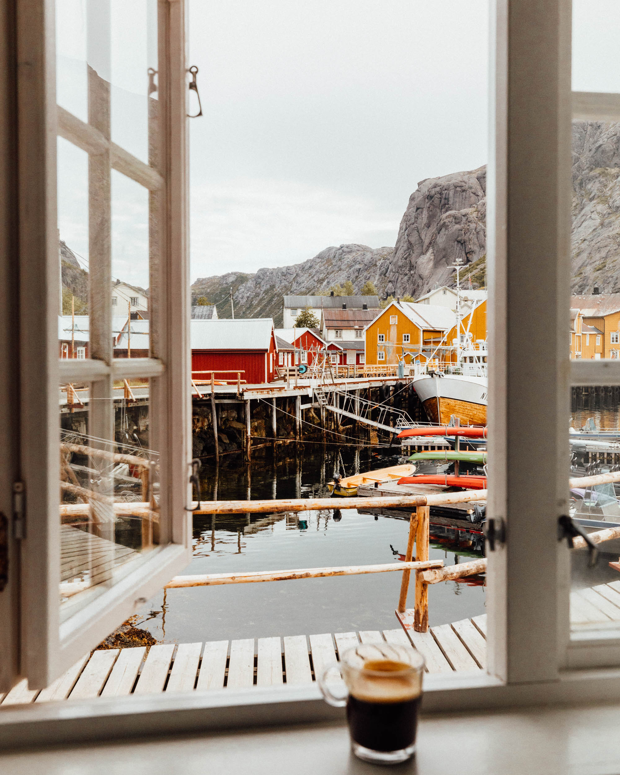 View from Hotel in Lofoten Norway Nusfjord Arctic Resort Traditional Fishermen Red Cabin with a Fjord View - Find Us Lost