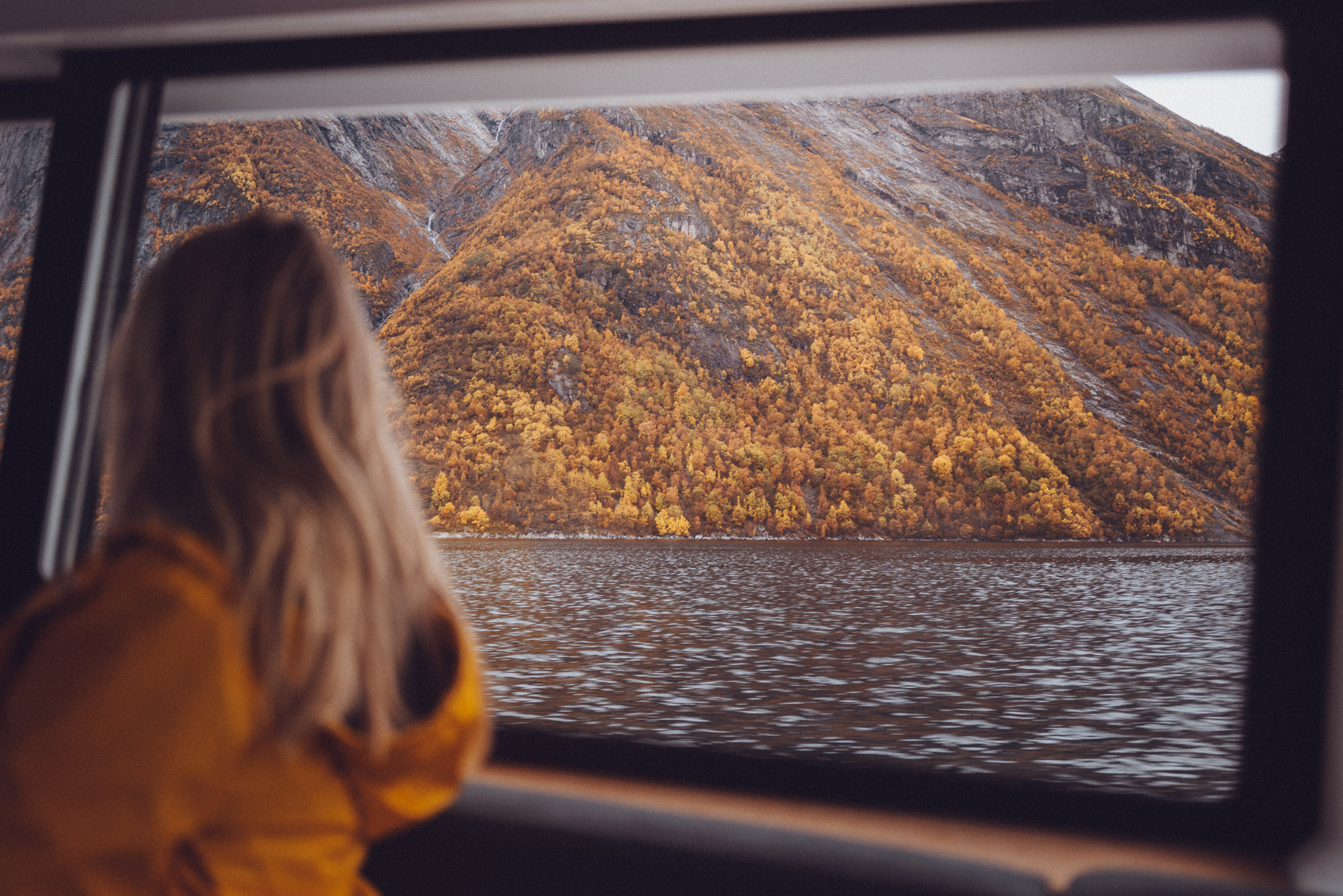 Fall in the Norwegian fjords from a boat in Alesund, Norway