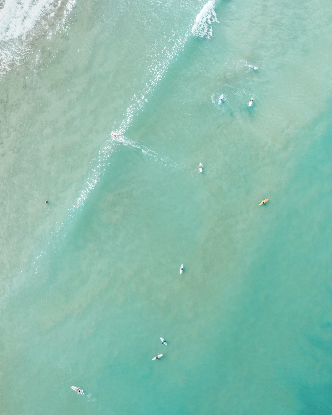 Kauai surfers, edited with @finduslostpresets